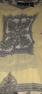 Beautiful yellow top with floral mandala detail